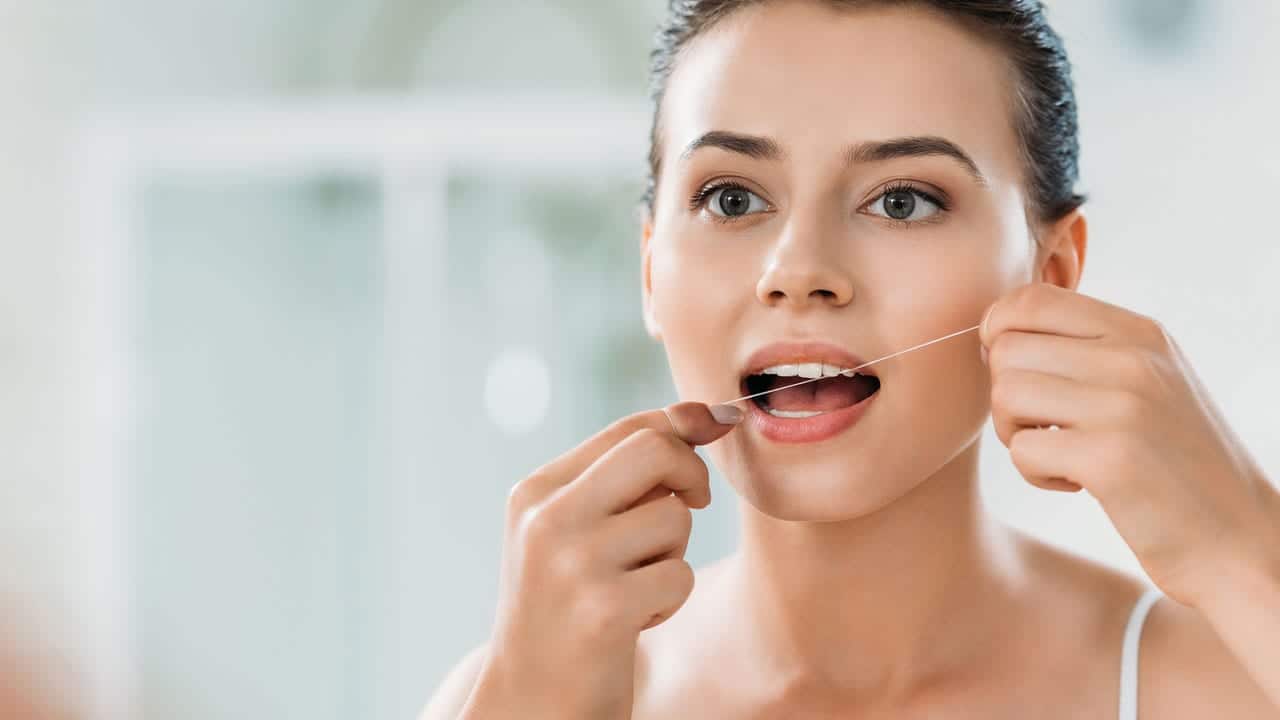 The Link Between Poor Flossing and Gum Disease Bedford